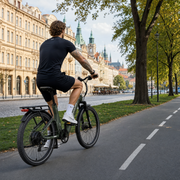TTGO E-SUVO - Riding, woman canal bridge